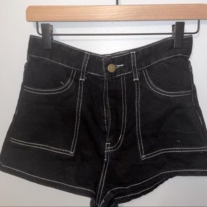 white lined black shorts〰